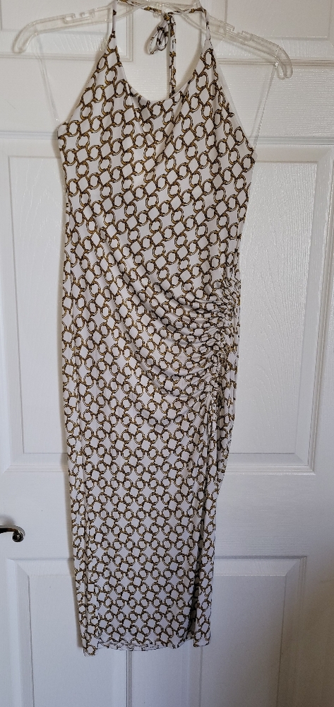 Slinky halter dress with chain link pattern. Size large.